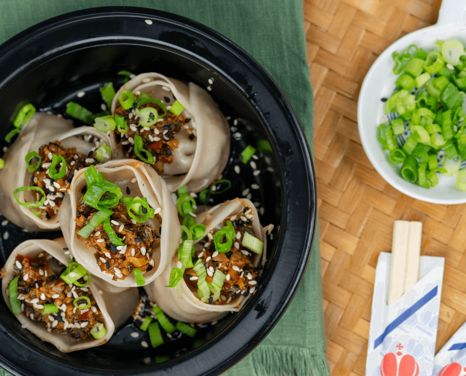Garlic Chili Mandu with chopsticks at Shiso Crispy